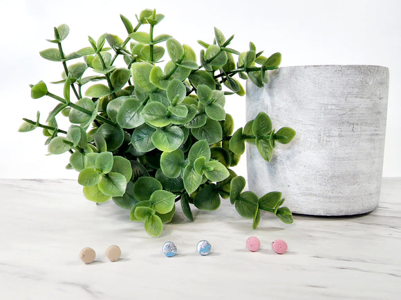 Polymer clay earrings. This micro stud pack contains 3 pairs of titanium finished studs. They feature soft pastel colours and silver foil. They are lightweight and comfortable! Great for sensitive ears.